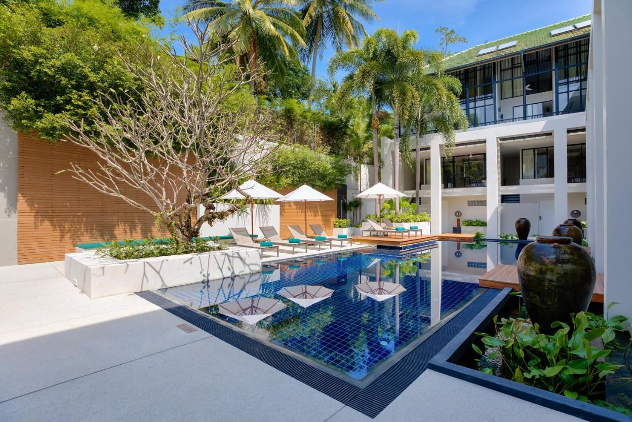 Outrigger Surin Beach Resort - Sha Extra Plus Eksteriør bilde The swimming pool at the hotel